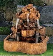 Decorative fountain and pottery for a Florida garden