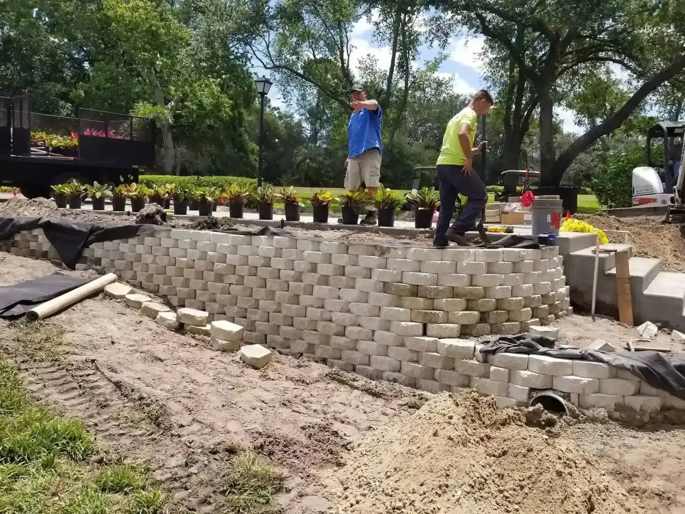 Professional landscape maintenance crew at work in Florida